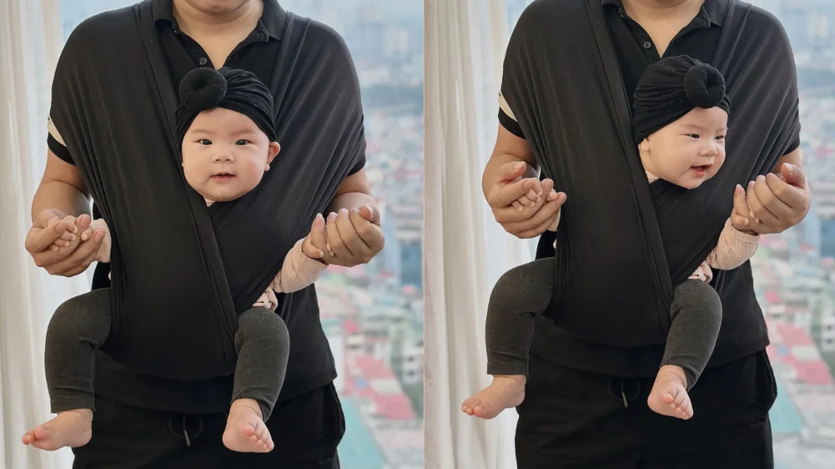 Luôn đảm bảo phần đầu bé thoáng khí, dễ quan sát – tránh nguy cơ ngạt thở khi địu sai cách (Ảnh: sưu tầm internet)